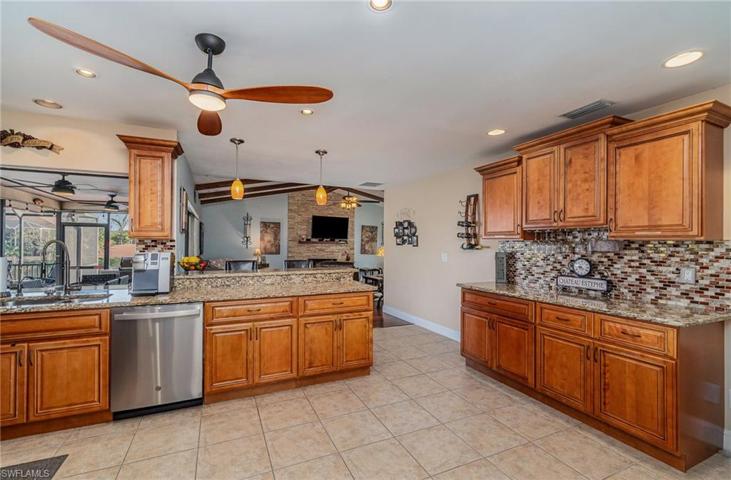 with granite and stainless steel appliances