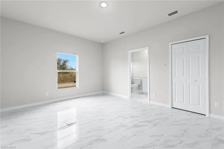 Master bedroom with plenty of natural light, spacious walk in closet and beautiful master bathroom.