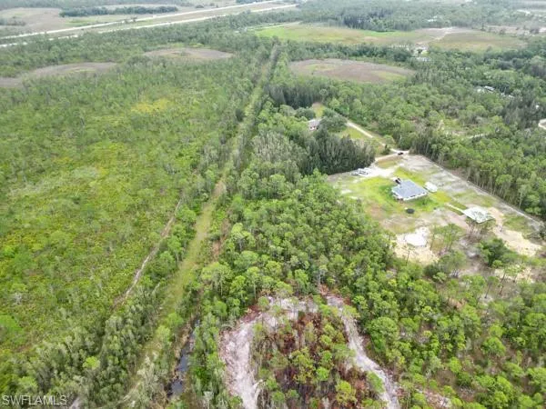 Aerial view of property's location with rural landscape