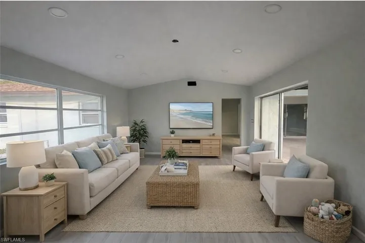 Virtual staging Living area with lofted ceiling, recessed lighting, and wood finished floors