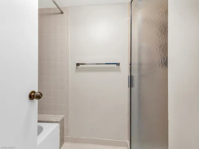 Bathroom with shower with separate bathtub