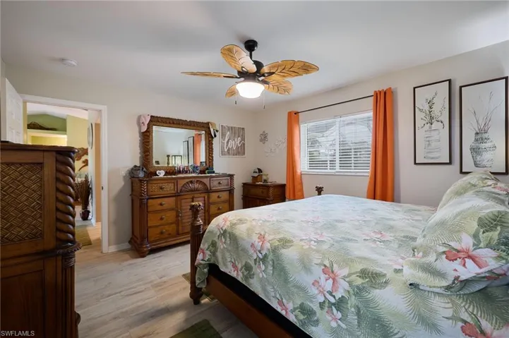 Bedroom featuring light wood-style flooring and ceiling fan