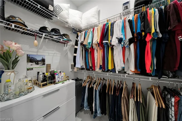 Walk in closet with washer / clothes dryer