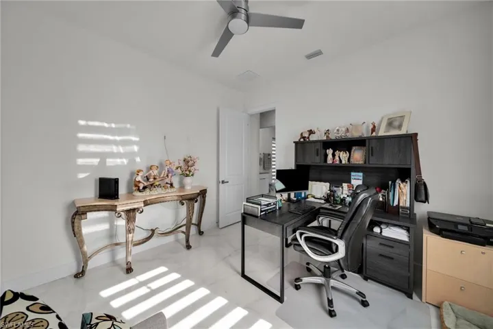 Office space with a ceiling fan