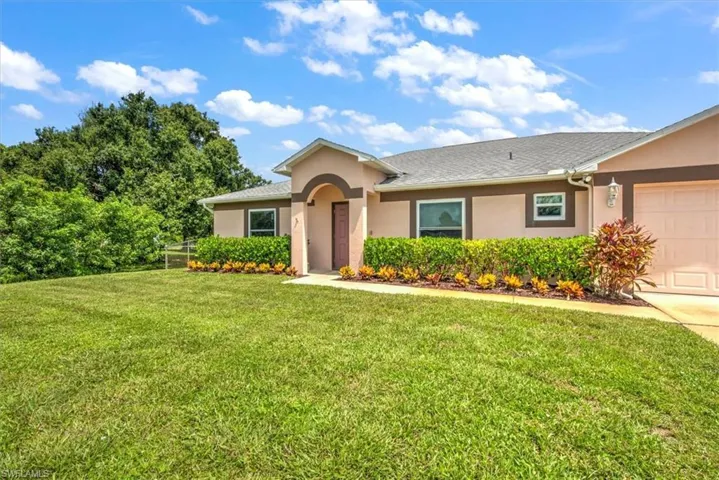 Established landscaping, new roof in 20', thermal double pane impact windows