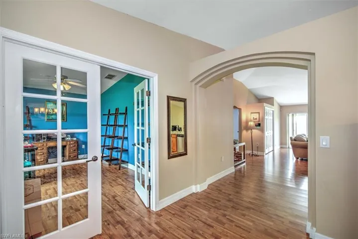 View from the entry. The room to the right is the den or flex room with French doors. Perfect for an office.