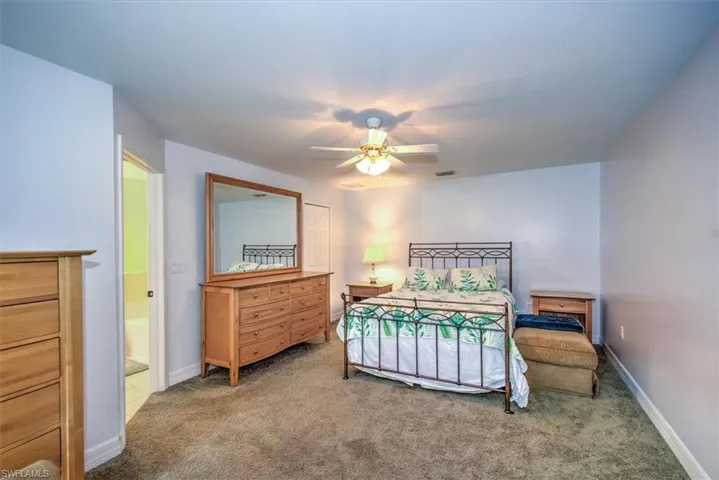 The master bedroom is huge and has a large walk in closet