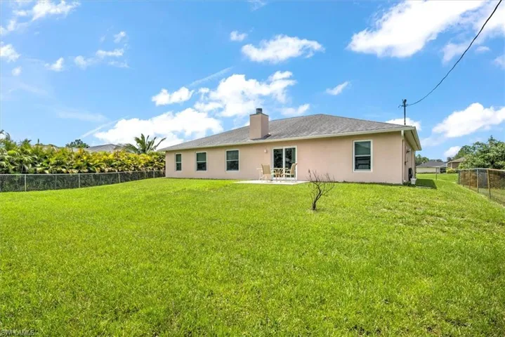 Large backyard with plenty of room to add a pool. Fenced in as well.