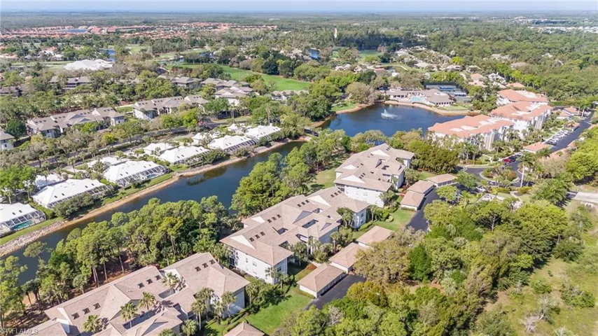 Aerial view of residential area with a large body of water