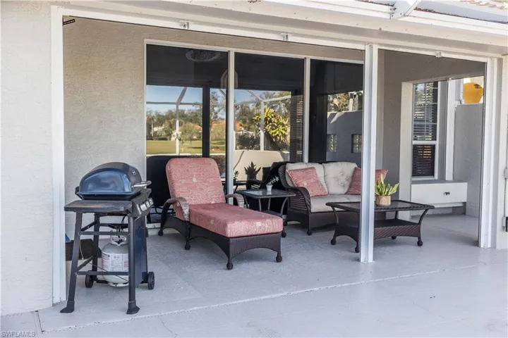 View of patio featuring area for grilling and outdoor lounge area