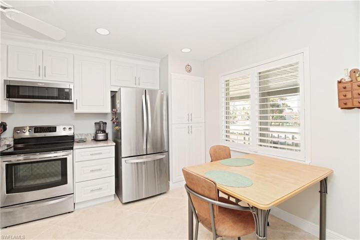 Eat-in kitchen, large pantry and plantation shutters.