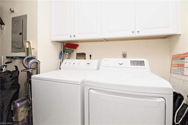 Newer washer and dryer.  Extra cabinets for more storage.