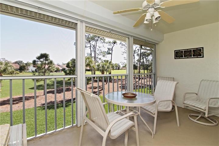 Screened lanai with electric shutters