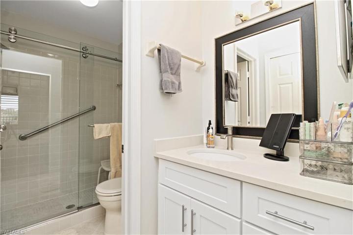 New raised vanity and walk-in shower with new door door.