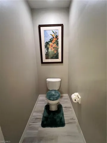 Water closet with tile floor