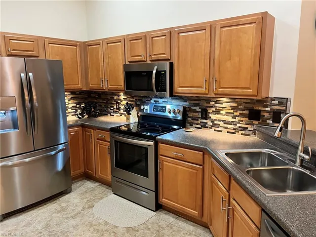 Spacious Kitchen including all stainless appliances and washer and dryer.