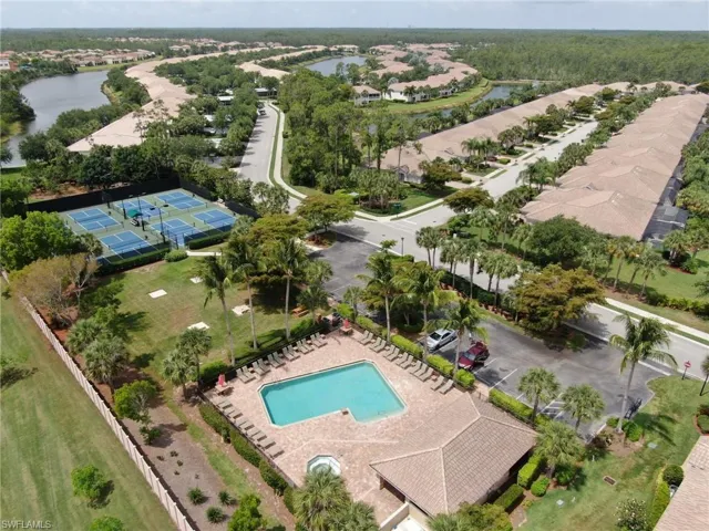 Aerial view featuring the South Community Pool and Spa and the Pickleball Courts.