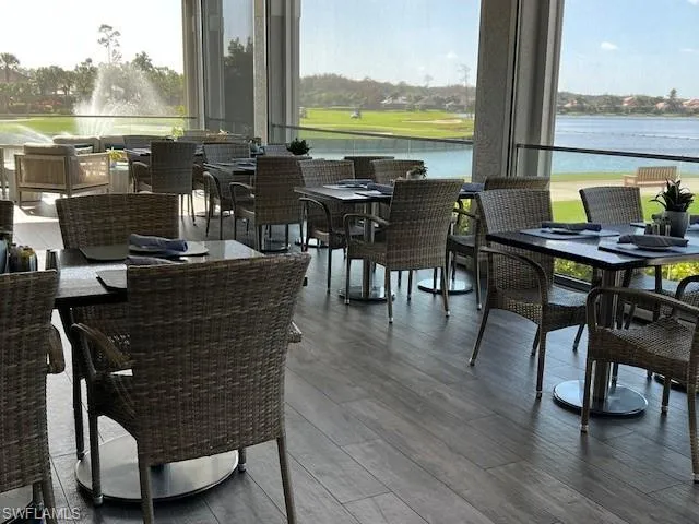 Enjoy dining outside with a beautiful lake and water feature view from the Sunset Grille.