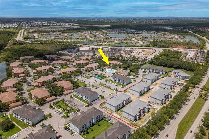 Aerial view of residential area with a nearby body of water
