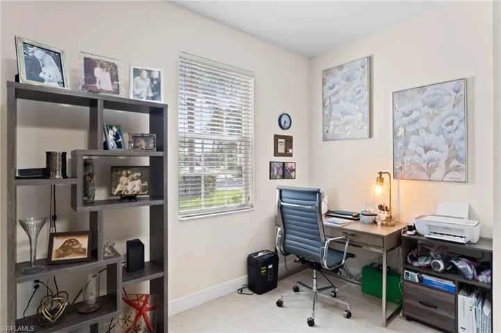 Office area with plenty of natural light and tile patterned floors