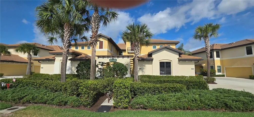 Mediterranean / spanish-style home with stucco siding and concrete driveway