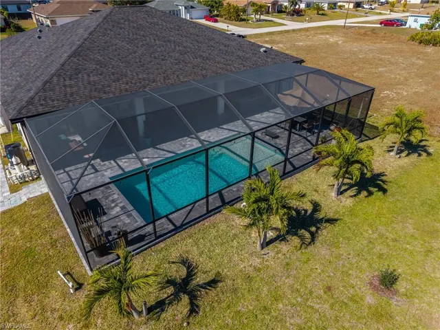 Aerial view of residential area with a pool