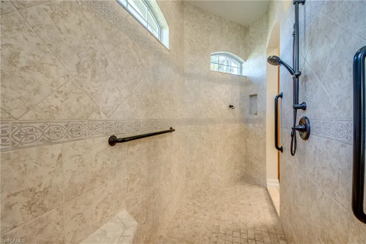 Bathroom with a tile shower
