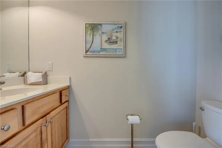 Bathroom with baseboards and vanity