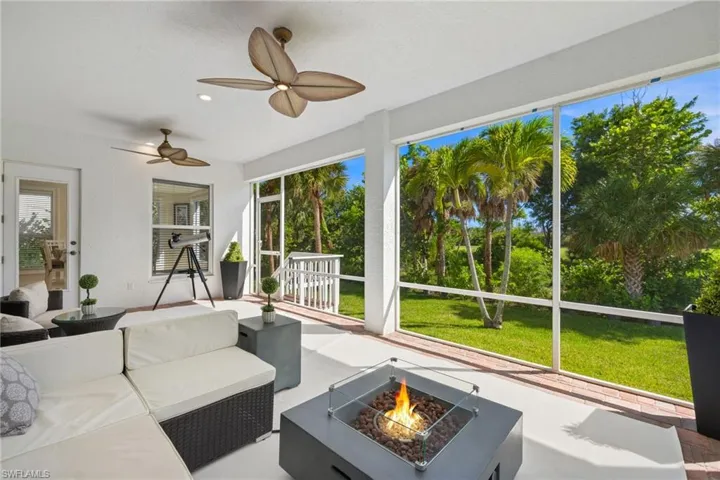 Sunroom / solarium with plenty of natural light and finished concrete flooring