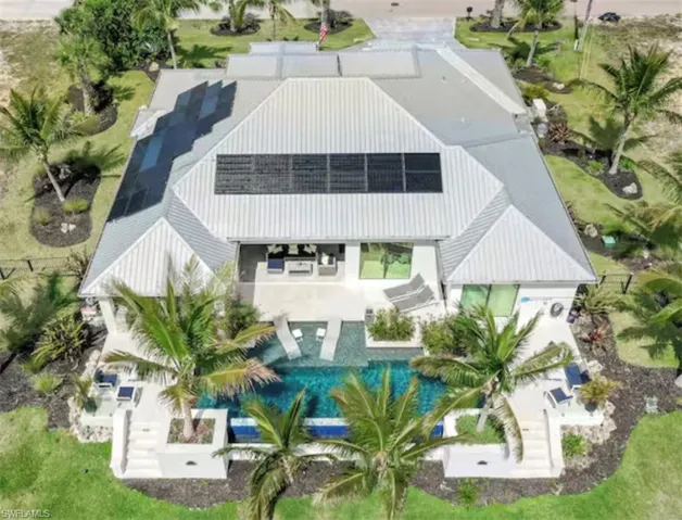 View from above of property with a pool area