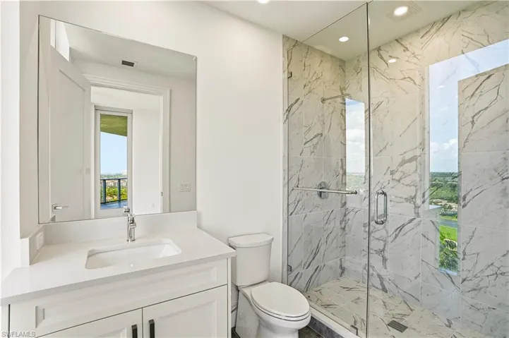 Guest bathroom featuring a large walk-in shower