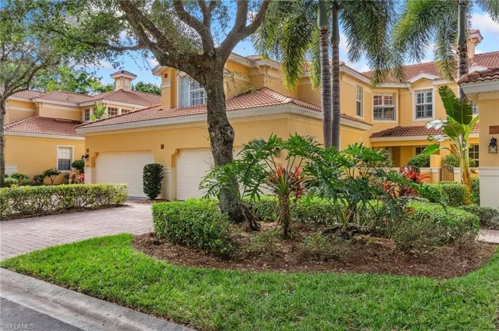 Mediterranean / spanish-style house featuring a garage