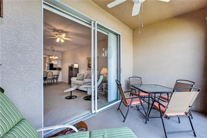 Your screened balcony has sliding glass doors into the living room and into the primary bedroom