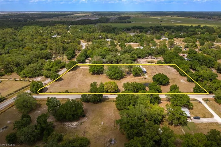 Aerial view with a rural view and a forest view