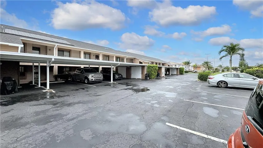 View of car parking with a carport