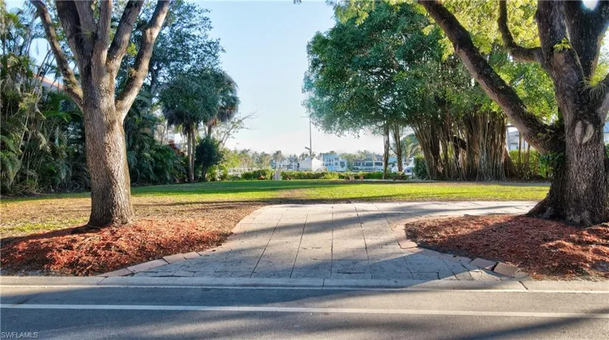 Surrounding community featuring a lawn