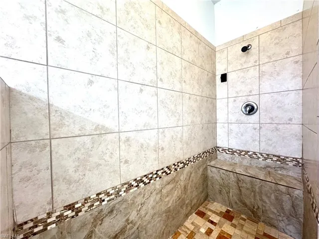 Bathroom with tiled shower