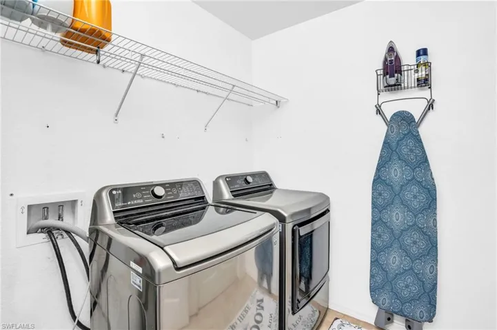Laundry area with separate washer and dryer