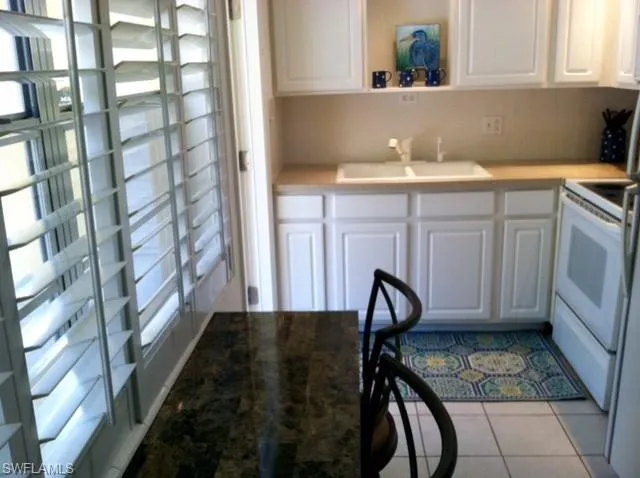 Eat in Kitchen, back door patio.