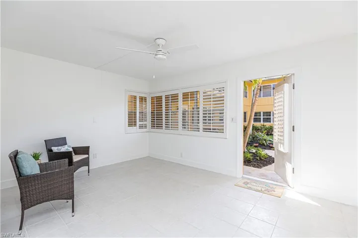 Entrance to your welcoming,  spacious  great room. Plantation shutter throughout. Inside feels like outside!