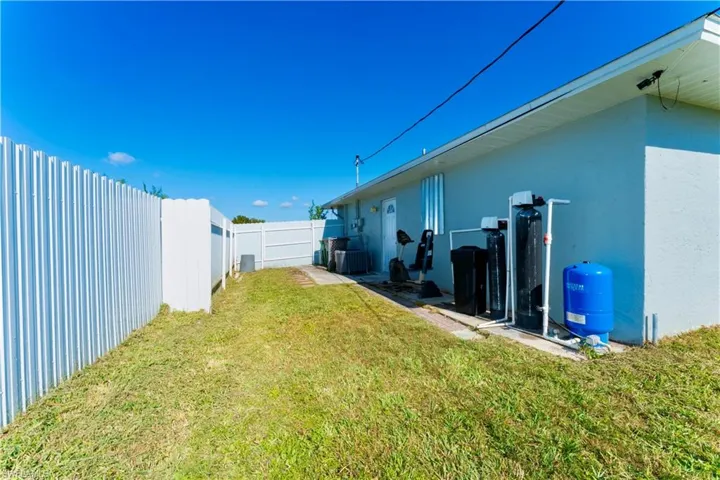 View of fenced backyard