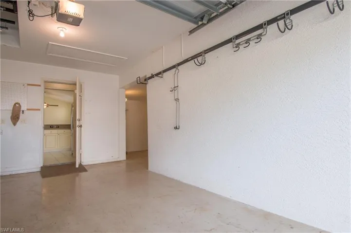 Garage with Rubbermaid track hanging system