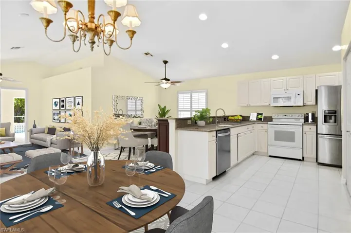 Kitchen with quartz counters and French Door Refrigerator