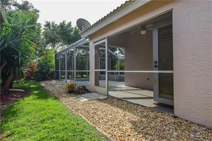 Your side yard with screened lanai