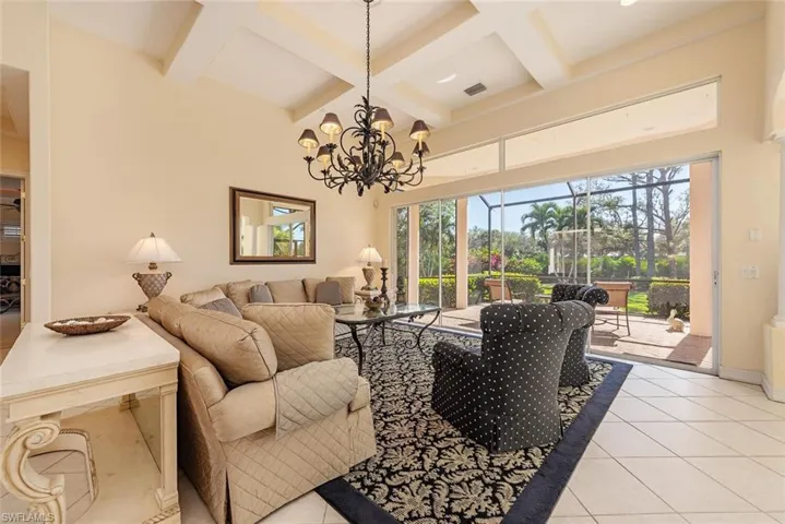 Living room with view of extra patio facing the golf course