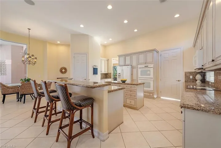 Kitchen with a center island and breakfast bar