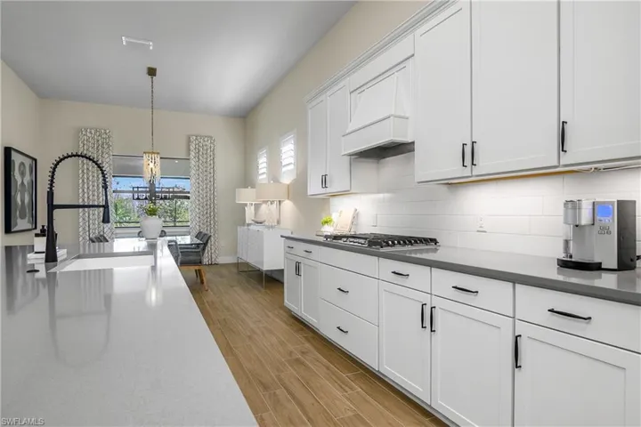 Open kitchen/dining is great for entertaining guests.
