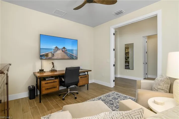 Den is perfect for relaxing or working from home.
