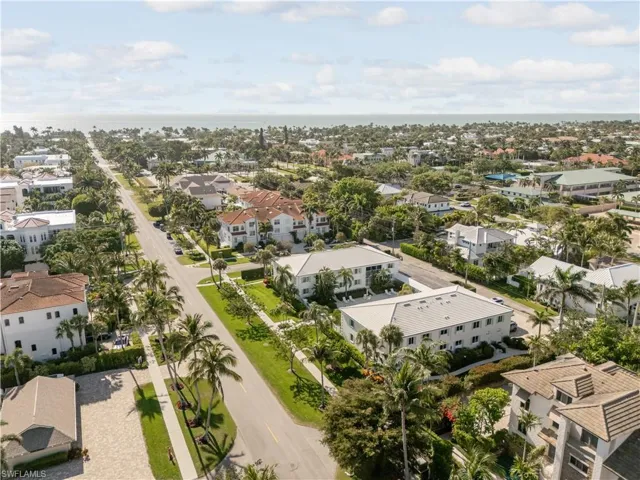 Birds eye view of property with a residential view