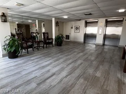 Building lobby featuring a paneled ceiling